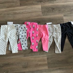 Lot of six 12 month pants, five are Carter’s, one is Gymboree